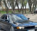 Чорний БМВ 7 Серія, об'ємом двигуна 4.4 л та пробігом 300 тис. км за 8500 $, фото 1 на Automoto.ua