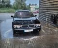 Черный БМВ 7 Серия, объемом двигателя 4.4 л и пробегом 210 тыс. км за 7850 $, фото 1 на Automoto.ua