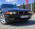 Черный БМВ 7 Серия, объемом двигателя 4 л и пробегом 480 тыс. км за 9000 $, фото 1 на Automoto.ua