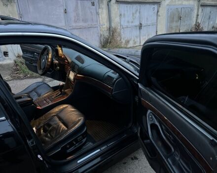 Черный БМВ 7 Серия, объемом двигателя 4.4 л и пробегом 300 тыс. км за 3650 $, фото 3 на Automoto.ua