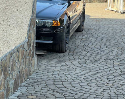 Черный БМВ 7 Серия, объемом двигателя 4.4 л и пробегом 380 тыс. км за 5000 $, фото 4 на Automoto.ua