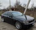 Черный БМВ 7 Серия, объемом двигателя 4.4 л и пробегом 350 тыс. км за 5000 $, фото 1 на Automoto.ua