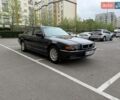 Черный БМВ 7 Серия, объемом двигателя 4.4 л и пробегом 380 тыс. км за 11000 $, фото 1 на Automoto.ua
