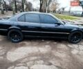 Черный БМВ 7 Серия, объемом двигателя 3 л и пробегом 400 тыс. км за 5500 $, фото 1 на Automoto.ua