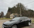 Черный БМВ 7 Серия, объемом двигателя 4.4 л и пробегом 358 тыс. км за 4599 $, фото 1 на Automoto.ua