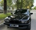 Черный БМВ 7 Серия, объемом двигателя 3.5 л и пробегом 300 тыс. км за 7000 $, фото 1 на Automoto.ua