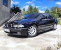 Черный БМВ 7 Серия, объемом двигателя 3 л и пробегом 380 тыс. км за 8700 $, фото 1 на Automoto.ua