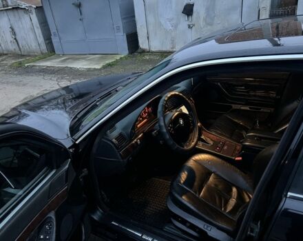 Черный БМВ 7 Серия, объемом двигателя 4.4 л и пробегом 300 тыс. км за 3650 $, фото 4 на Automoto.ua