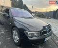 Черный БМВ 7 Серия, объемом двигателя 4.5 л и пробегом 160 тыс. км за 5000 $, фото 1 на Automoto.ua