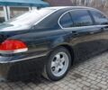 Черный БМВ 7 Серия, объемом двигателя 4.4 л и пробегом 285 тыс. км за 4500 $, фото 1 на Automoto.ua
