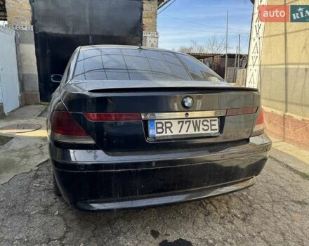 Черный БМВ 7 Серия, объемом двигателя 3 л и пробегом 400 тыс. км за 2500 $, фото 1 на Automoto.ua
