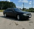 Черный БМВ 7 Серия, объемом двигателя 3.6 л и пробегом 380 тыс. км за 5600 $, фото 1 на Automoto.ua