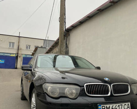 Черный БМВ 7 Серия, объемом двигателя 4.4 л и пробегом 400 тыс. км за 3600 $, фото 1 на Automoto.ua