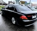 Черный БМВ 7 Серия, объемом двигателя 4.4 л и пробегом 400 тыс. км за 6000 $, фото 1 на Automoto.ua