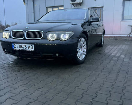 Черный БМВ 7 Серия, объемом двигателя 3.6 л и пробегом 380 тыс. км за 7000 $, фото 1 на Automoto.ua