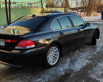 Черный БМВ 7 Серия, объемом двигателя 4.4 л и пробегом 167 тыс. км за 8699 $, фото 1 на Automoto.ua