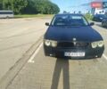 Черный БМВ 7 Серия, объемом двигателя 2.99 л и пробегом 372 тыс. км за 8000 $, фото 1 на Automoto.ua