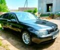 Черный БМВ 7 Серия, объемом двигателя 4.4 л и пробегом 400 тыс. км за 3150 $, фото 1 на Automoto.ua