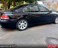 Черный БМВ 7 Серия, объемом двигателя 3.6 л и пробегом 321 тыс. км за 4999 $, фото 1 на Automoto.ua