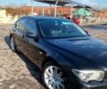 Чорний БМВ 7 Серія, об'ємом двигуна 3 л та пробігом 300 тис. км за 3200 $, фото 1 на Automoto.ua