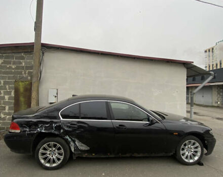 Черный БМВ 7 Серия, объемом двигателя 4.4 л и пробегом 400 тыс. км за 3600 $, фото 2 на Automoto.ua