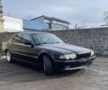Чорний БМВ 7 Серія, об'ємом двигуна 3 л та пробігом 300 тис. км за 2999 $, фото 1 на Automoto.ua