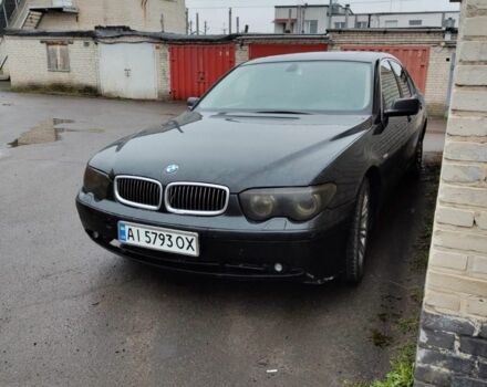Черный БМВ 7 Серия, объемом двигателя 4.4 л и пробегом 200 тыс. км за 3500 $, фото 1 на Automoto.ua