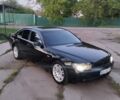 Чорний БМВ 7 Серія, об'ємом двигуна 3.6 л та пробігом 450 тис. км за 6950 $, фото 1 на Automoto.ua