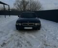 Черный БМВ 7 Серия, объемом двигателя 4.4 л и пробегом 200 тыс. км за 5300 $, фото 1 на Automoto.ua