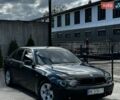 Черный БМВ 7 Серия, объемом двигателя 3 л и пробегом 474 тыс. км за 5500 $, фото 1 на Automoto.ua