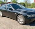 Черный БМВ 7 Серия, объемом двигателя 4.4 л и пробегом 308 тыс. км за 6400 $, фото 1 на Automoto.ua