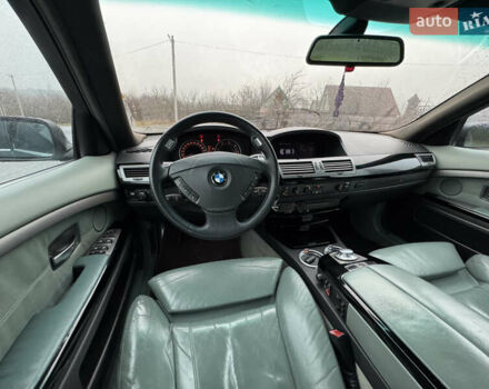 Черный БМВ 7 Серия, объемом двигателя 4 л и пробегом 280 тыс. км за 6500 $, фото 13 на Automoto.ua