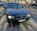 Черный БМВ 7 Серия, объемом двигателя 3 л и пробегом 352 тыс. км за 6000 $, фото 1 на Automoto.ua