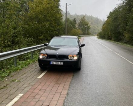 Черный БМВ 7 Серия, объемом двигателя 4.4 л и пробегом 326 тыс. км за 7000 $, фото 2 на Automoto.ua