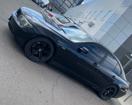 Черный БМВ 7 Серия, объемом двигателя 4.4 л и пробегом 325 тыс. км за 6700 $, фото 1 на Automoto.ua