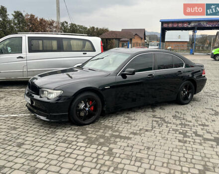Черный БМВ 7 Серия, объемом двигателя 4.4 л и пробегом 400 тыс. км за 6500 $, фото 3 на Automoto.ua