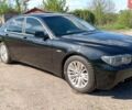 Черный БМВ 7 Серия, объемом двигателя 4.4 л и пробегом 308 тыс. км за 6100 $, фото 1 на Automoto.ua
