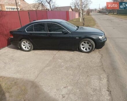 Чорний БМВ 7 Серія, об'ємом двигуна 3.5 л та пробігом 230 тис. км за 9300 $, фото 1 на Automoto.ua
