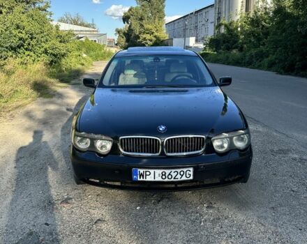 Черный БМВ 7 Серия, объемом двигателя 3.9 л и пробегом 390 тыс. км за 4000 $, фото 1 на Automoto.ua
