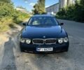 Черный БМВ 7 Серия, объемом двигателя 3.9 л и пробегом 390 тыс. км за 4000 $, фото 1 на Automoto.ua