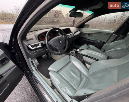 Черный БМВ 7 Серия, объемом двигателя 4 л и пробегом 280 тыс. км за 6500 $, фото 14 на Automoto.ua