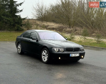 Черный БМВ 7 Серия, объемом двигателя 4 л и пробегом 280 тыс. км за 6500 $, фото 1 на Automoto.ua