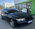 Чорний БМВ 7 Серія, об'ємом двигуна 3 л та пробігом 250 тис. км за 3006 $, фото 1 на Automoto.ua