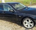 Черный БМВ 7 Серия, объемом двигателя 4.4 л и пробегом 231 тыс. км за 5200 $, фото 1 на Automoto.ua