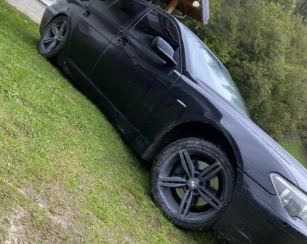 Черный БМВ 7 Серия, объемом двигателя 4.4 л и пробегом 326 тыс. км за 7000 $, фото 1 на Automoto.ua