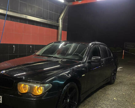 Черный БМВ 7 Серия, объемом двигателя 4.4 л и пробегом 325 тыс. км за 6700 $, фото 5 на Automoto.ua