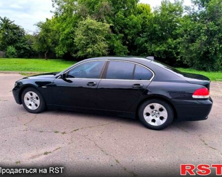 Чорний БМВ 7 Серія, об'ємом двигуна 4.4 л та пробігом 410 тис. км за 7700 $, фото 1 на Automoto.ua