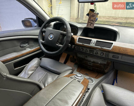 Черный БМВ 7 Серия, объемом двигателя 4.4 л и пробегом 262 тыс. км за 4200 $, фото 9 на Automoto.ua