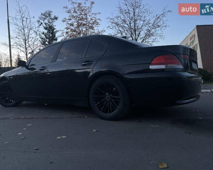 Черный БМВ 7 Серия, объемом двигателя 4.4 л и пробегом 196 тыс. км за 7200 $, фото 22 на Automoto.ua