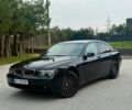 Черный БМВ 7 Серия, объемом двигателя 2.99 л и пробегом 440 тыс. км за 7700 $, фото 1 на Automoto.ua